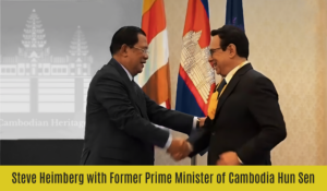 Steve Heimberg shaking hands with Former Prime Minister of Cambodia Hun Sen